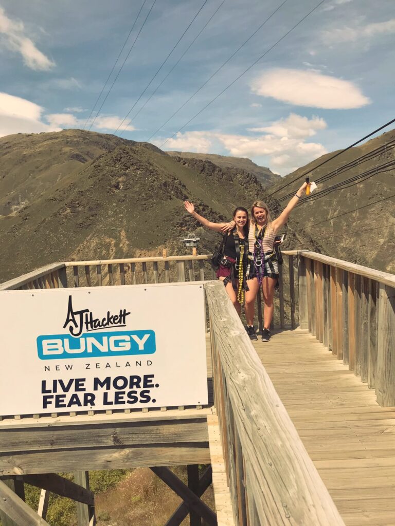 melody and friend about to go on AJ hakcett bungy jump, new zealand