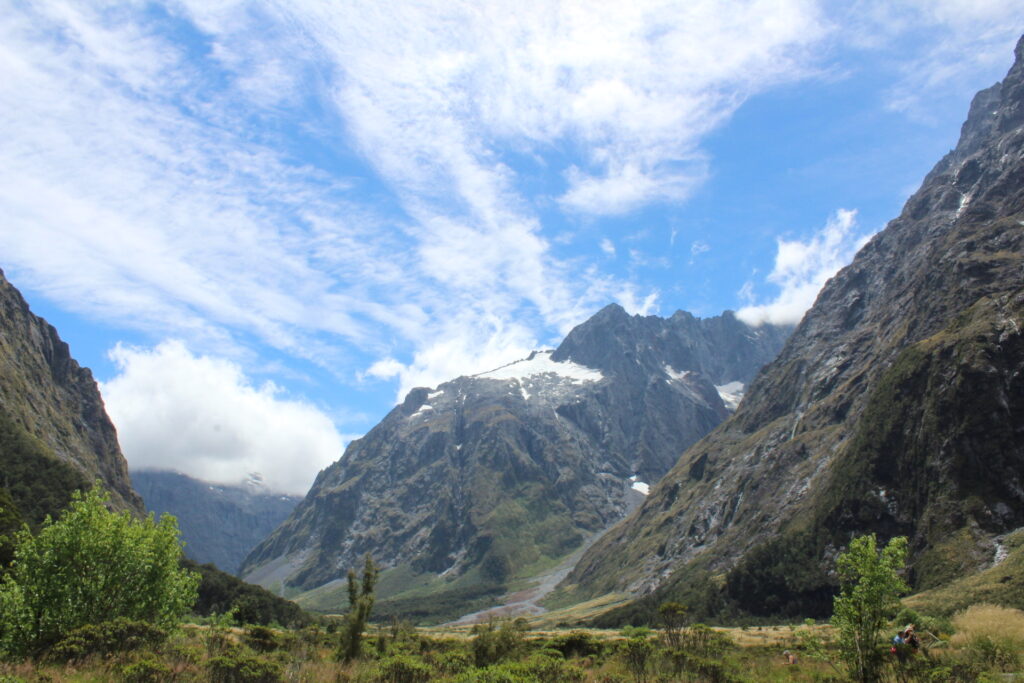 mountains on road to milford sound, new zeland