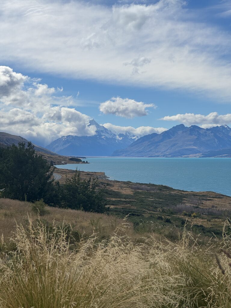 snow covered mount cook, new zealand. lake pukaki in foreground