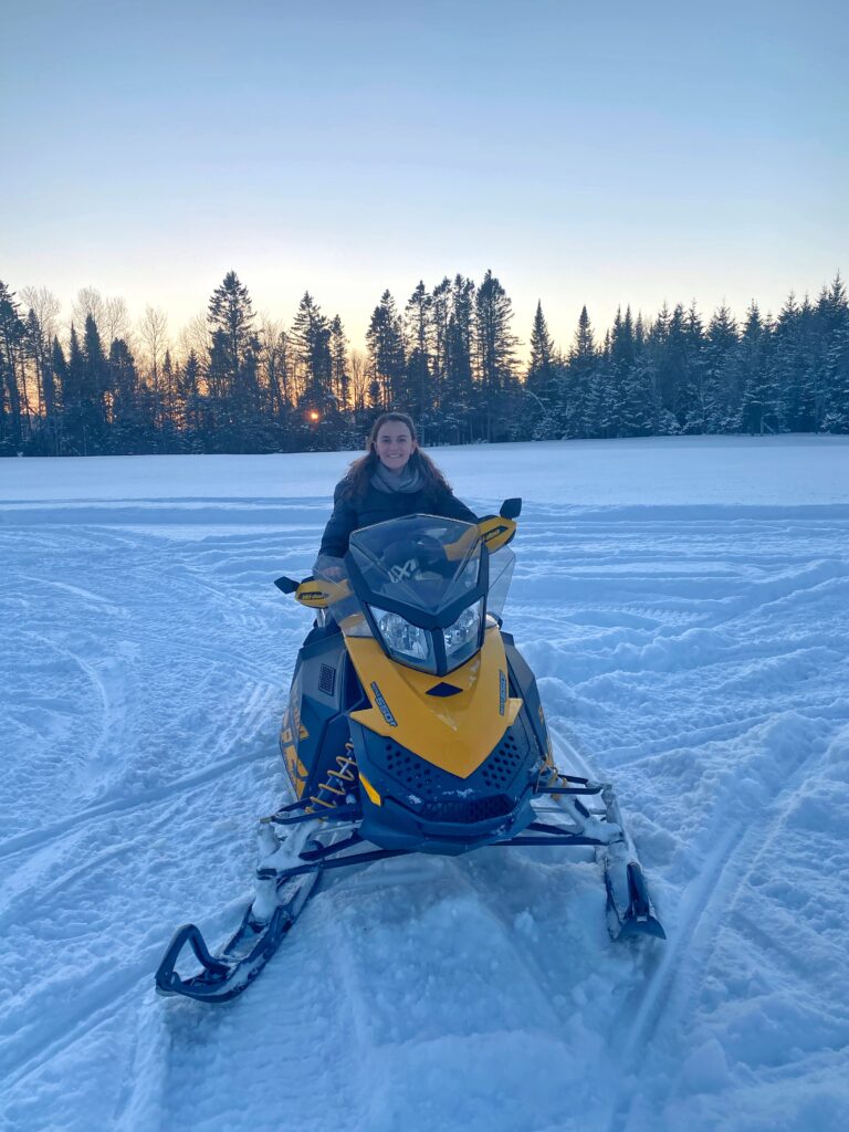 melody on snow mobile, quebec, canada