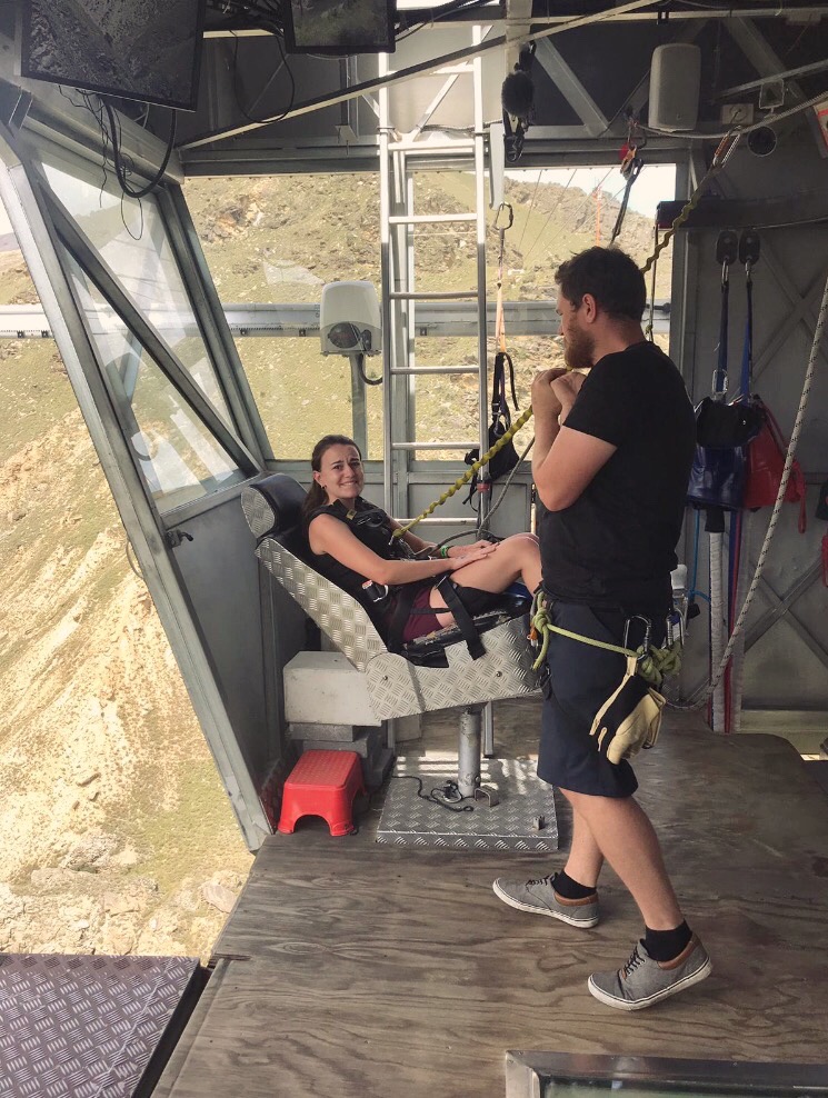 melody looking nervous before bungy jumping on nevis bungy, queenstown, new zealand.